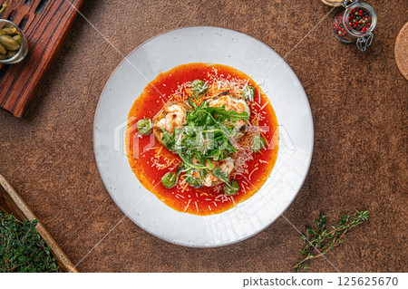 Portion of aubergine appetizer with shimp 125625670