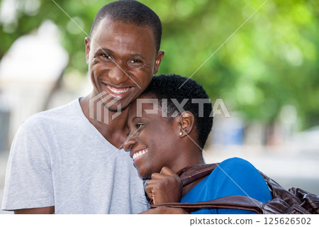 Close-up of young couple, happy. Close-up of young couple, happy. 125626502