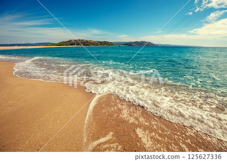 Seascape on a sunny day. View of Possidi cape beach, Greece, Europe 125627336