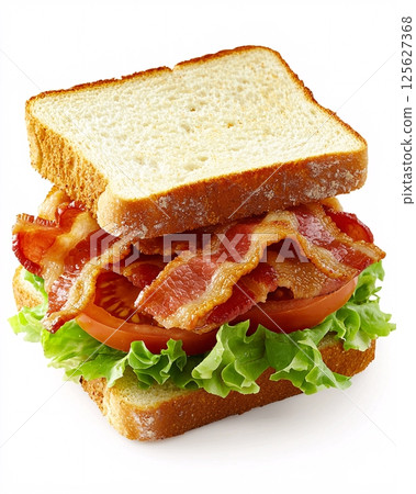 Delicious Bacon Sandwich with Fresh Lettuce and Tomato on Soft Whole Wheat Bread Garnished  Delicious Bacon Sandwich with Fresh Lettuce and Tomato on Soft Whole Wheat Bread Garnished  125627368