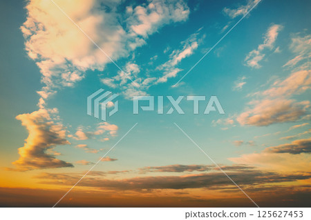 Colorful cloudy sky at sunset. Gradient color. Sky texture. Abstract nature background Colorful cloudy sky at sunset. Gradient color. Sky texture. Abstract nature background 125627453