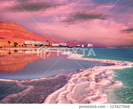 Seascape in the morning. Pink sunrise over the Dead Sea. Seascape in the morning. Pink sunrise over the Dead Sea. 125627666