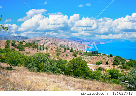 Seascape in summer. Beautiful mountain sea coast 125627718