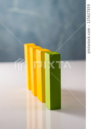 The color palette of the wooden blocks creates an appealing picture. Each element is an individual play unit for a child's development. The color palette of the wooden blocks creates an appealing picture. Each element is an individual play unit for a child's development. 125627859