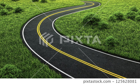 An empty winding road with yellow dashed lines, surrounded by fresh green grass. 125628081