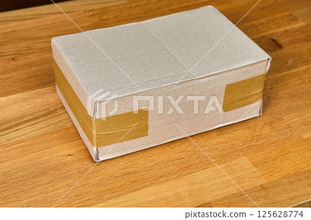 Cardboard Box on Desk 125628774