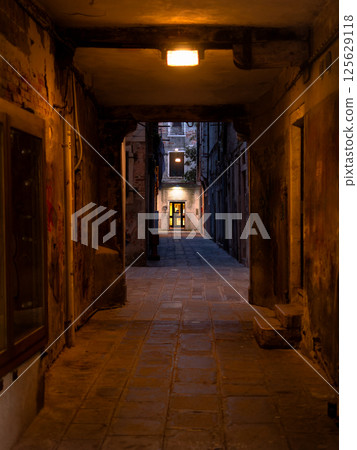 Narrow Old European Alleyway at Night 125629118