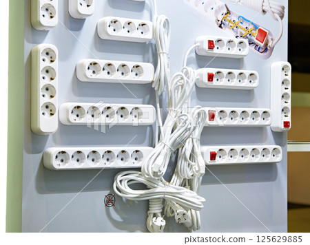 Extension cord and power strip Extension cord and power strip 125629885