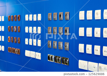 Light switches and sockets in store Light switches and sockets in store 125629886
