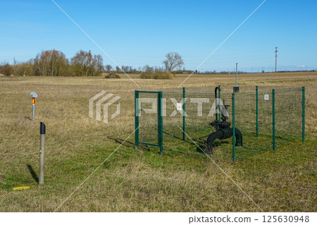 Fenced gas pipeline pipe valve station for gas transmission in rural area Fenced gas pipeline pipe valve station for gas transmission in rural area 125630948