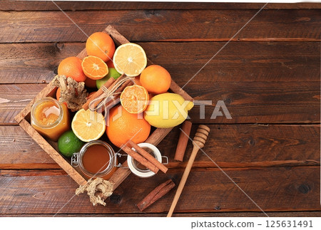 Healthy natural food during flu and colds. Selection of fresh fruits with vitamin C and natural ingredients to strengthen the immune system Organic products to protect against viruses, selective focus 125631491