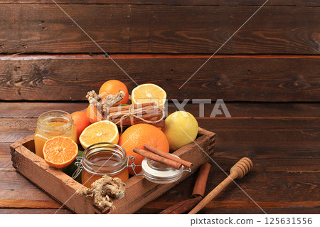 Healthy natural food during flu and colds. Selection of fresh fruits with vitamin C and natural ingredients to strengthen the immune system Organic products to protect against viruses, selective focus 125631556