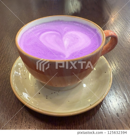 Hot latte with cream Hot latte with cream 125632394