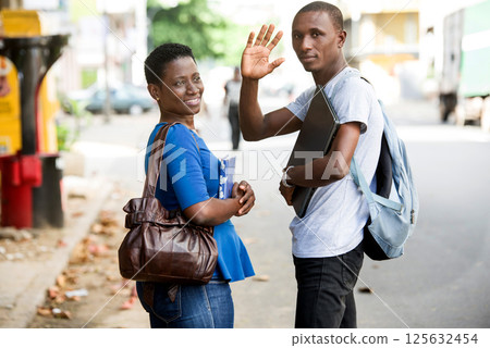 portrait of young happy students outdoors 125632454