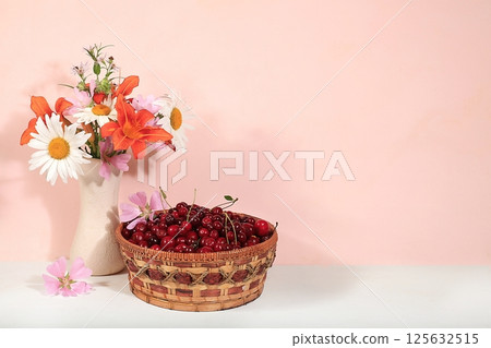 Summer cherry berries in baskets on a sunny background with daisies,wild flowers, harvesting in the village, the concept of healthy natural food, breakfast with ingredients, shop advertising, cafe Summer cherry berries in baskets on a sunny background with daisies,wild flowers, harvesting in the village, the concept of healthy natural food, breakfast with ingredients, shop advertising, cafe 125632515
