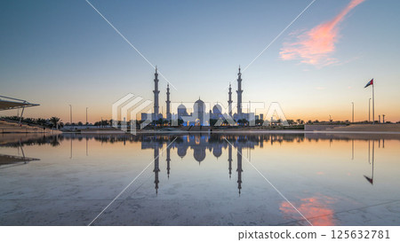 Sheikh Zayed Grand Mosque in Abu Dhabi day to night timelapse after sunset, UAE Sheikh Zayed Grand Mosque in Abu Dhabi day to night timelapse after sunset, UAE 125632781