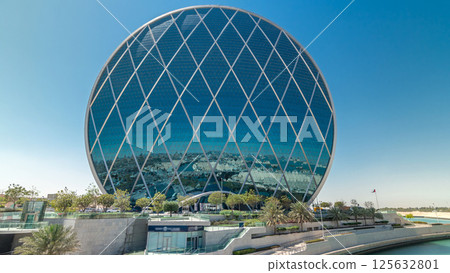 Circular skyscraper Aldar Headquarters Building timelapse hyperlapse in Abu Dhabi, UAE. 125632801