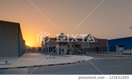 Sunset at free zone of Ajman timelapse. Ajman is the capital of the emirate of Ajman in the United Arab Emirates. 125632809