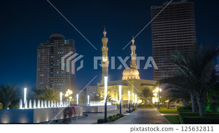 Al Noor Mosque in Sharjah at night timelapse. United Arab Emirates Al Noor Mosque in Sharjah at night timelapse. United Arab Emirates 125632811