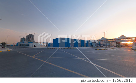 Sunset at free zone of Ajman timelapse. Ajman is the capital of the emirate of Ajman in the United Arab Emirates. 125632813