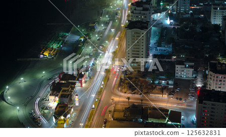 Cityscape of Ajman from rooftop night aerial timelapse 125632831