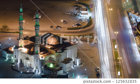 Cityscape of Ajman from rooftop night aerial timelapse 125632835