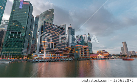 Business Financial Downtown City and Skyscrapers Tower Building at Marina Bay day to night timelapse, Singapore Business Financial Downtown City and Skyscrapers Tower Building at Marina Bay day to night timelapse, Singapore 125632875
