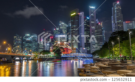 Business Financial Downtown City and Skyscrapers Tower Building at Marina Bay night timelapse hyperlapse, Singapore 125632911