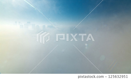 Skylines under the thick fog at the street timelapse of Abu Dhabi at morning 125632951