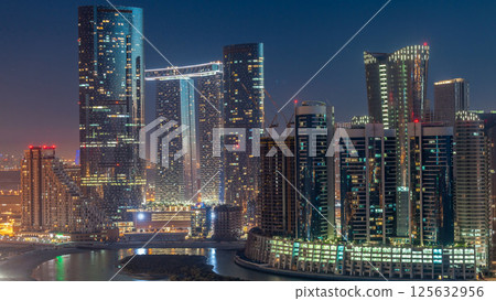 Buildings on Al Reem island in Abu Dhabi day to night timelapse from above. Buildings on Al Reem island in Abu Dhabi day to night timelapse from above. 125632956