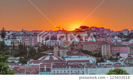 Sunrise over Lisbon aerial cityscape skyline timelapse from viewpoint of St. Peter of Alcantara, Portugal. 125633018