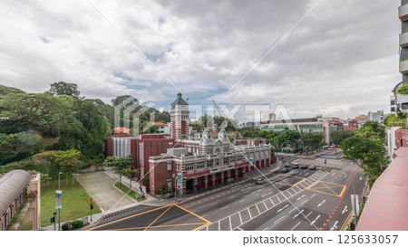 Street traffic near the fire station of Singapore aerial timelapse. Street traffic near the fire station of Singapore aerial timelapse. 125633057
