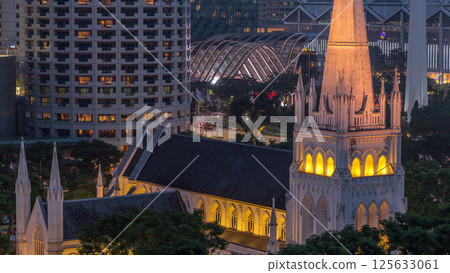 St. Andrew's Cathedral aerial day to night timelapse. It is an Anglican cathedral in Singapore, the country's largest cathedral. St. Andrew's Cathedral aerial day to night timelapse. It is an Anglican cathedral in Singapore, the country's largest cathedral. 125633061