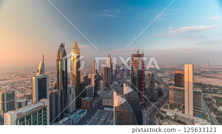 Skyline view of the buildings of Sheikh Zayed Road and DIFC aerial timelapse in Dubai, UAE. 125633121