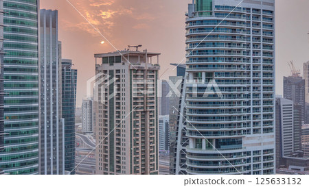 Residential and office buildings in Jumeirah lake towers district timelapse in Dubai 125633132