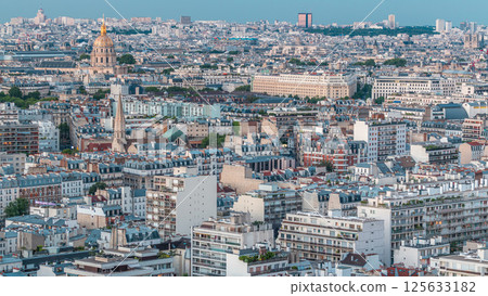 Aerial panorama above houses rooftops in a Paris day to night timelapse 125633182