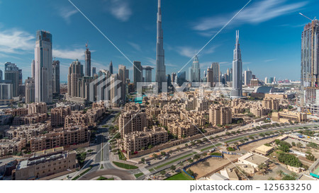 Dubai Downtown skyline timelapse with Burj Khalifa and other towers panoramic view from the top in Dubai 125633250