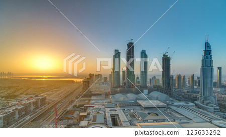Dubai downtown with sunrise timelapse. Top view from above 125633292