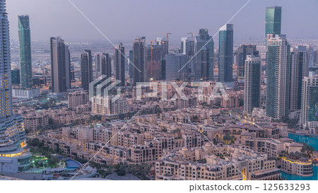 Dubai downtown night to day timelapse. Top view from above Dubai downtown night to day timelapse. Top view from above 125633293