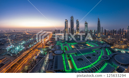 Dubai downtown night to day timelapse. Top view from above Dubai downtown night to day timelapse. Top view from above 125633294