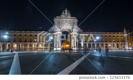 Triumphal arch at Rua Augusta at Commerce square night timelapse hyperlapse in Lisbon, Portugal. 125633370