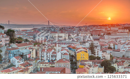 Lisbon at sunset aerial panoramic view of city centre with red roofs at autumn evening timelapse, Portugal Lisbon at sunset aerial panoramic view of city centre with red roofs at autumn evening timelapse, Portugal 125633371