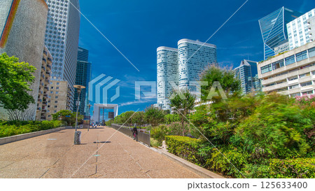 Skyscrapers of La Defense timelapse hyperlapse - Modern business and residential area in the near suburbs of Paris, France. 125633400