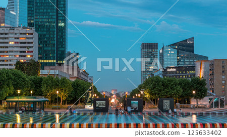 Paris cityscape with modern buildings in business district La Defense day to night timelapse. Glass facade skyscrapers. Paris, France Paris cityscape with modern buildings in business district La Defense day to night timelapse. Glass facade skyscrapers. Paris, France 125633402