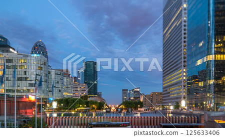 Paris cityscape with modern buildings in business district La Defense day to night timelapse. Paris, France 125633406