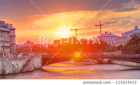 Le Pont D'Arcole bridge at sunset with boats timelapse, Paris, France, Europe 125633415