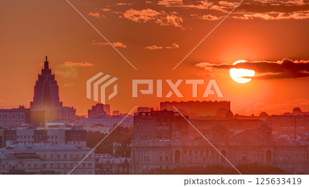 Panorama with Stalin skyscraper during sunset timelapse in Moscow, Russia 125633419
