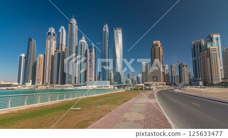Scenic view of Dubai Marina Skyscrapers with boats timelapse hyperlapse, Skyline, View from sea, United Arab Emirates 125633477