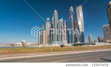 Scenic view of Dubai Marina Skyscrapers with boats timelapse hyperlapse, Skyline, View from sea, United Arab Emirates 125633478