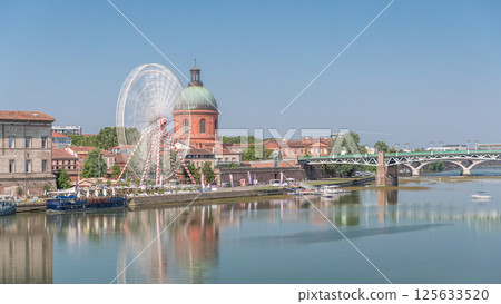 Aerial view of the Garonne River to La Grave Hospital's green dome timelapse hyperlapse. Toulouse, France Aerial view of the Garonne River to La Grave Hospital's green dome timelapse hyperlapse. Toulouse, France 125633520